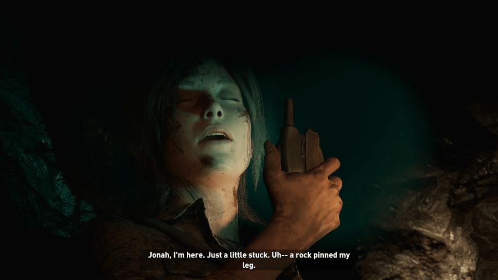 A woman holding a walkie talkie, stating Jonah I'm here. Just a little stuck. Uh-- a rock pinned my [UNNATURAL BREAK IN LINE] leg.